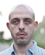 Роман Либеров