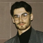 Максим Караев