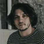 Александр Олейников